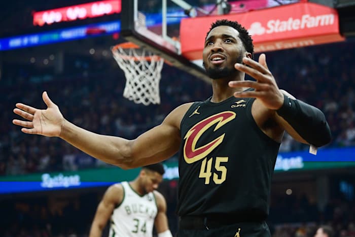 Dec 29, 2023; Cleveland, Ohio, USA; Cleveland Cavaliers guard Donovan Mitchell (45) reacts after a play during the first half against the Milwaukee Bucks at Rocket Mortgage FieldHouse.